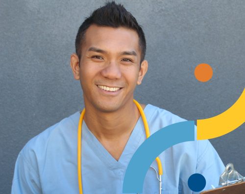 Asian Male nurse smiling into camera